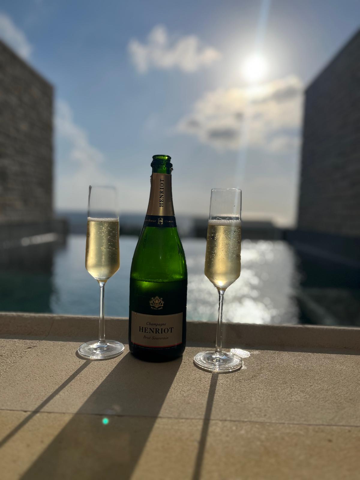 Champagne beside a private pool