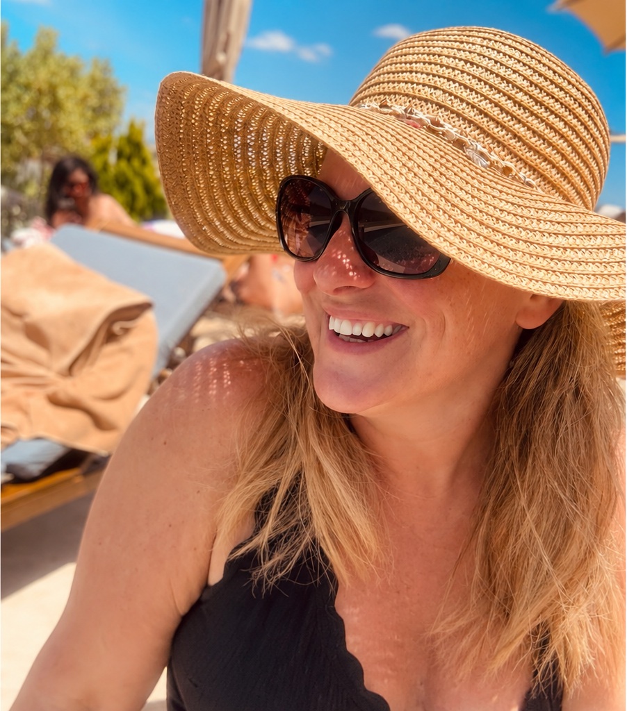Lynn enjoying a sunny holiday